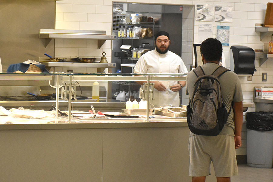 A customer explores options at the Truax Campus Atrium Cafe.