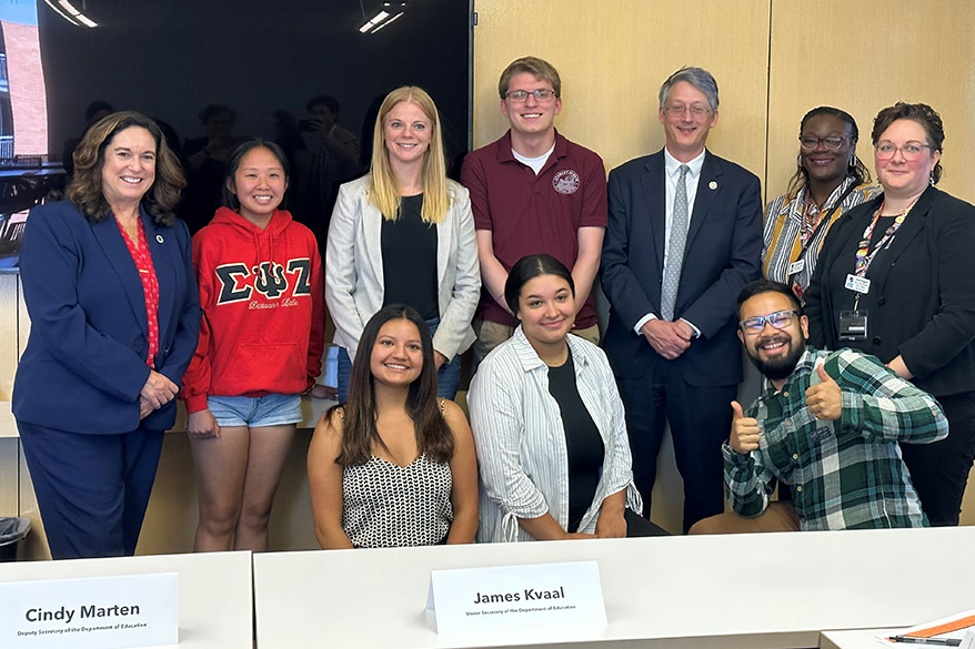 Students pose with Department of Education Officials at the SSTAR Lab. Pictured are, front row, from left: Mercedes Hernandez-Natera, Sinetra Wilson and Kai Brito; back row, from left, Deputy Secretary Cindy Marten, Sheng Ying Vang, Kate Westaby, Casey Konkol, Under Secretary James Kvaal, Lai’Kita Buie, Kris Flugum. 