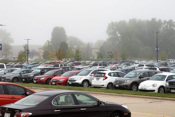 Cars fill one of the main student parking lots at the Madison College Truax Campus.