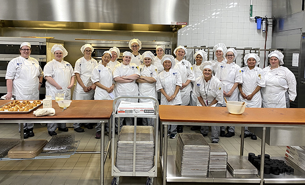 Students in the baking class include, front row, from left: Kaya Luo, Meghan Reiche, Anabel Imhoff, MC Mueller, Jennifer Bock; back row, from left: Jordan Keehn, Katie Vican, Madeleine Walstad, Maddie Wilson, Evelyn Byrnes, Hailey Barrett, Lela Vue, Briana Jackson, Maddie Housley, Meghan Sweeney, Michele Mendez Tapia, Ashley Varholik.