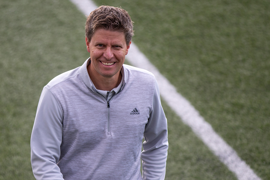 Madison College Athletic Director Jason Verhelst crosses the soccer field after a recent match.