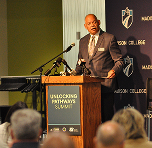 Madison College President Dr. Jack Daniels, shown speaking at an Unlocking Pathways summit earlier this year, has announced his plans to retire in June 2024.