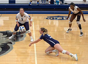 Madison College’s Kendall Weisensel (center) digs the ball during a match on Sept. 27.