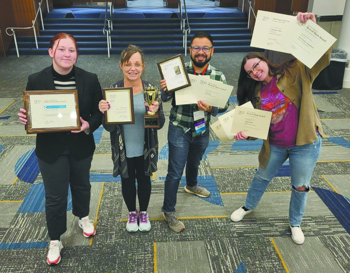 Clarion staff members Maddie Thorman, Kelly Feng, Kai Brito and Hannah Powell show the awards they received at the Associated Collegiate Press National College Media Convention in Atlanta.