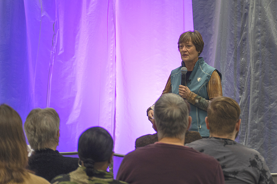 Fashion marketing program director Betty Hurd speaks to the audience at the Embrace Fashion Show on Nov. 29.