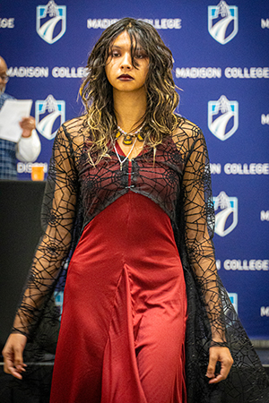 A student model walks down the runway at the Madison College Embrace Fashion Show on Nov. 29.