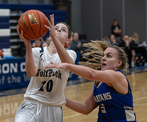 Madison College guard Kaylee Anzalone (10)  goes up for a shot during the season-opening game against the University of Dubuque JV.