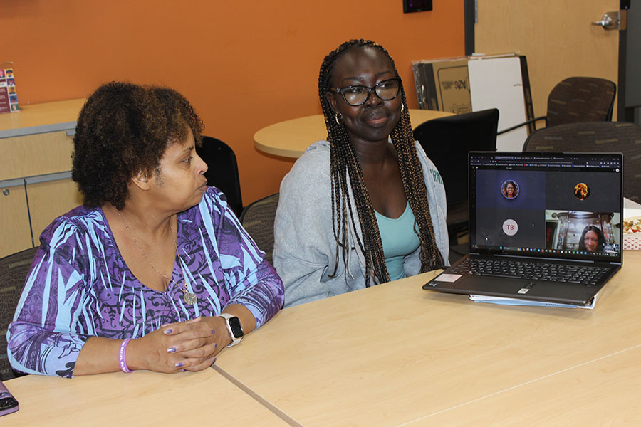 Black Student Union President Annette Crowder, left, and Secretary Zawadi Ozulamoi host a hybrid meeting from the Intercultural Exchange.