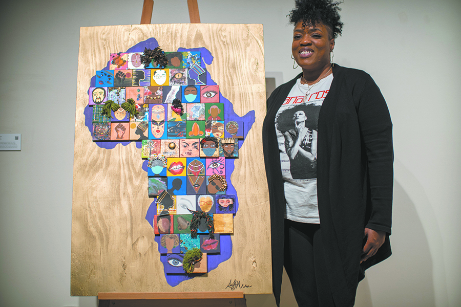 Artist+Monica+Mims+discusses+her+mixed+media+artwork%2C+%E2%80%9CHappening%2C%E2%80%9D+that+is+part+of+the+%E2%80%9CRestoring+the+Black+Woman%E2%80%9D+art+exhibit+on+display+in+the+Truax+Campus+Gallery.