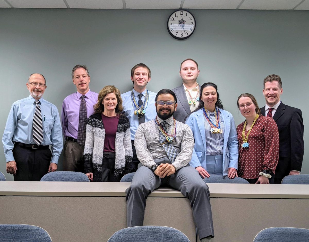 BPA members celebrate a stellar performance at the Statewide competition. (from left to right) Front Row: Advisor Theresa Laws-Dahl, Kai Brito, Emily Cauthen, Morgan Witthun, Michael Malone. Back Row: Advisor Dan O’Brien, Advisor Jeff Quinlan, Jason Nelson, Branden Metzler.