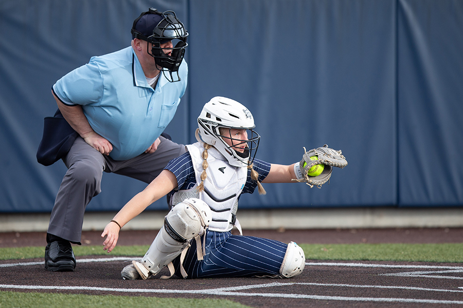 Madison College catcher Mackenna Schultz frames a pitch as the umpire considers his call during a game against Milwaukee Area Technical College on Feb. 27.