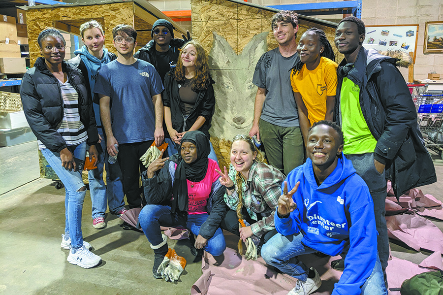 Students participating in the Volunteer Center’s Alternative Break Trip this past January gather for a group photograph.