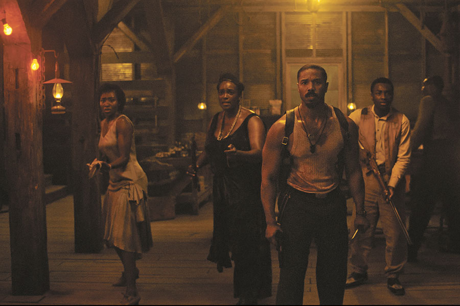 Jayme Lawson, Wunmi Mosaku, Michael B. Jordan, Miles Caton and Li Jun Li prepare for battle in “Sinners.” (Warner Bros. Pictures/TNS)