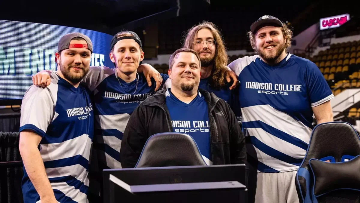Madison College Esports coach Joe Hanson, center, has stepped down after five seasons and 10 national titles. (Photo provided by Madison College Athletics)