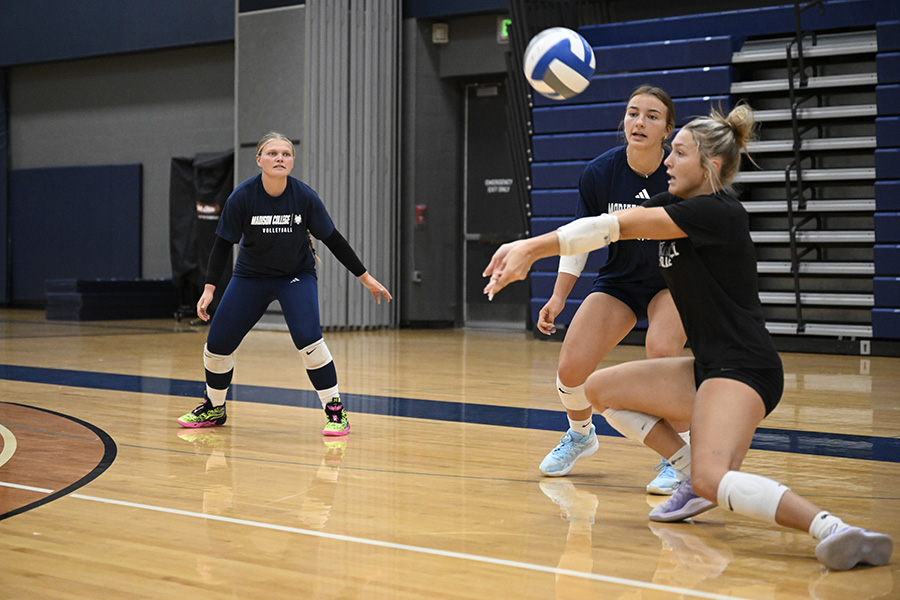 Madison College volleyball players receive a serve during a recent practice.