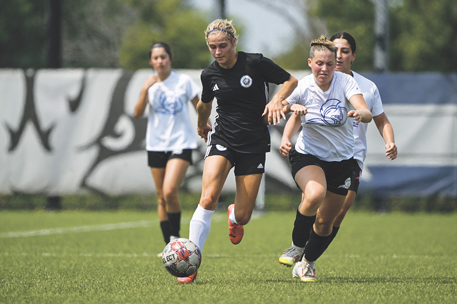 Madison College women’s soccer player Ava Schmidt out-races defenders during a recent scrimmage.