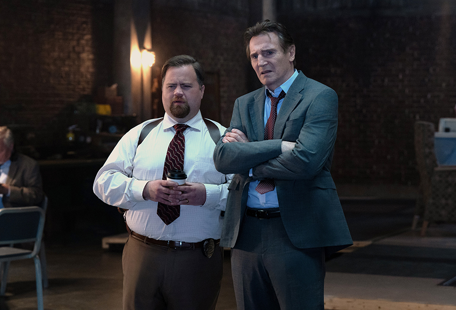 Paul Walter Hauser, left, as Ed Hocken Jr. and Liam Neeson as Frank Drebin Jr.  in "The Naked Gun." 
