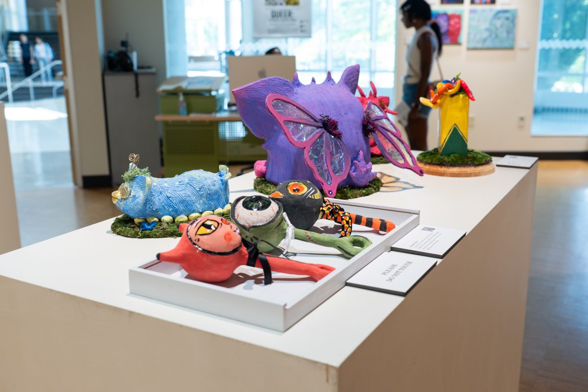 This photo was taken at the Queer: A Proud & Loud Art Show, located at the Gallery at Truax. 