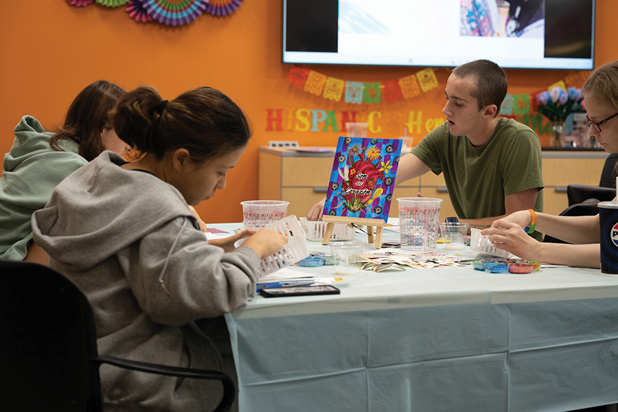 Students participate in a mixed-media art workshop led by Madison artist Angelica Contreras.