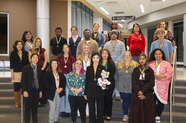 Photo of the newly inducted members of Phi Theta Kappa.