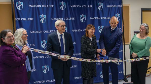 Madison College President Dr. Jennifer Berne, center, is joined by Gov. Tony Evers, third from left, former Madison College President Dr. Jack Daniels III, second from right, and Madison Mayor Satya Rhodes-Conway, far right, at the ribbon cutting event for the new Early Learning Campus at the Goodman South Campus