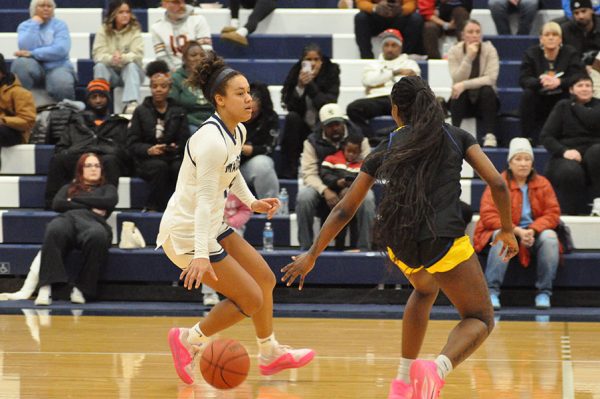 Maia Ellis, left, drives the ball upcourt against a Blackhawk Technical College opponent on Jan. 10.