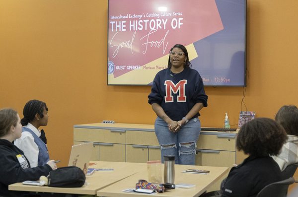Photo of Marissa Holmes speaking to an audience
