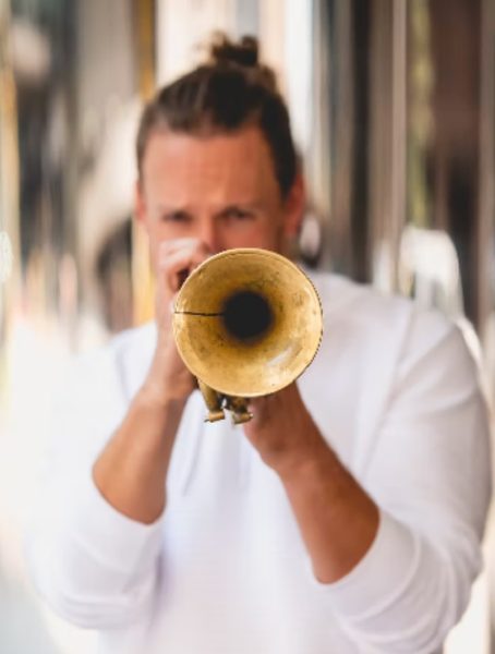 Man playing a trumpet.